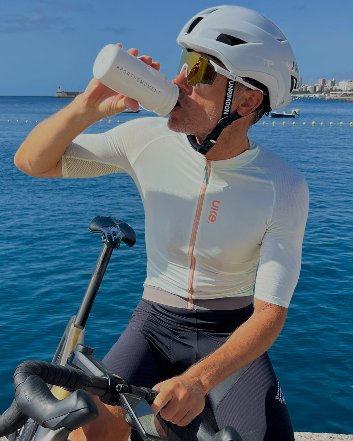 Cyclist riding in a lightweight UKE jersey